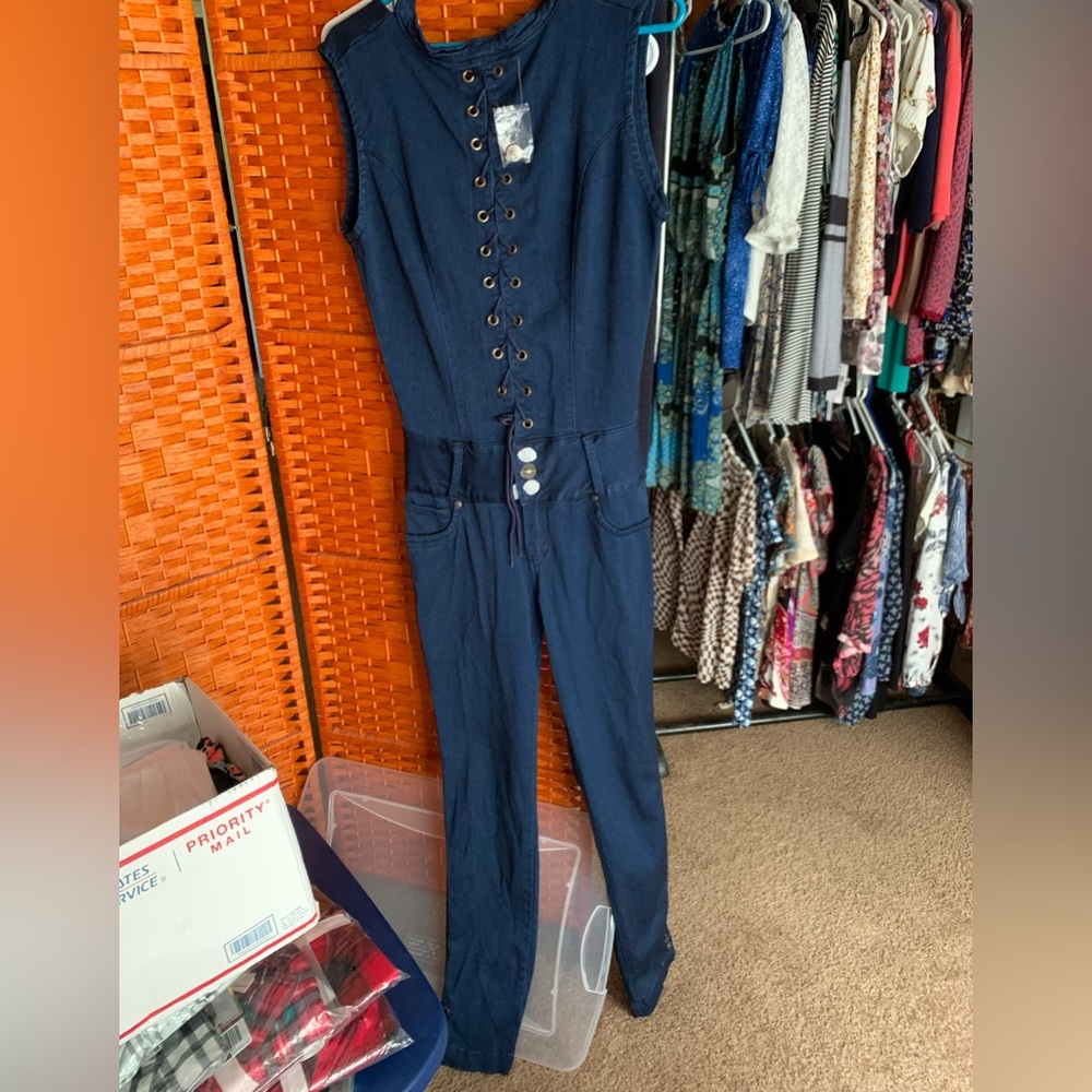 NM jump suit new with tags very soft.